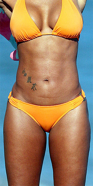 Mel B in Gold Bikini